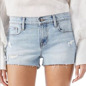 Frame Le Cutoff denim shorts w distress detail. Zip fly, light wash. Inseam 2.5”